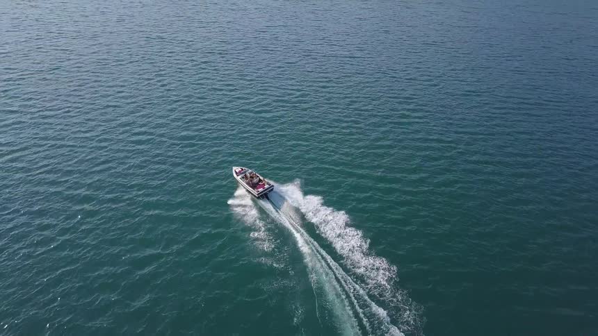 People Riding In Boat On Lake Aerials