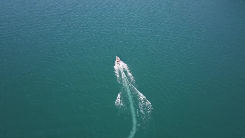 People Riding In Boat On Lake Aerials