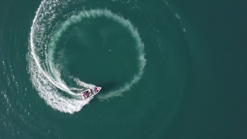 People Riding In Boat On Lake Aerials