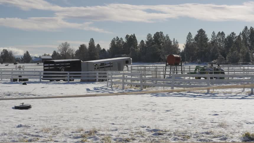 People Riding Horses In Snow