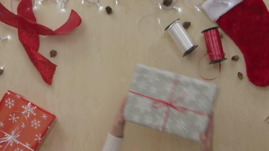 Person Wrapping Gifts