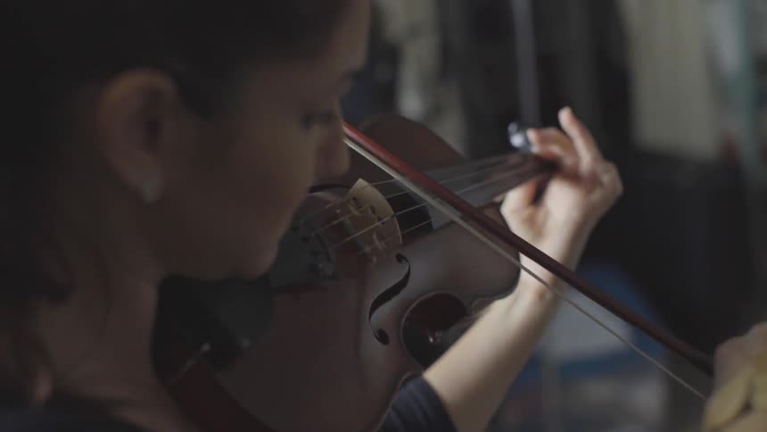 People Playing Violin