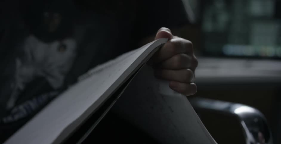 A piece of paper being torn from a notebook