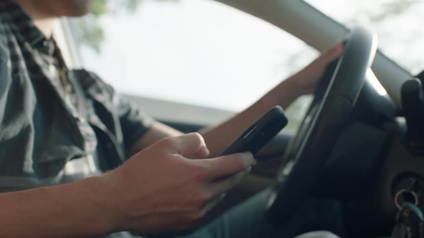 Man On Phone While Driving