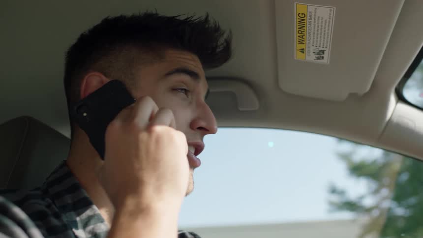 Man On Phone While Driving