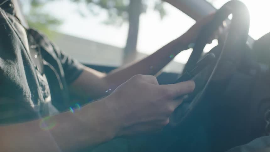 Man On Phone While Driving