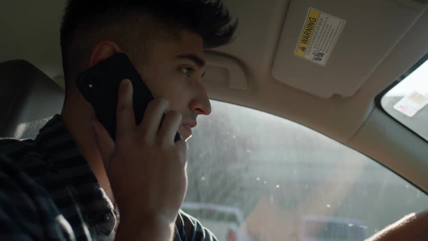 Man On Phone While Driving