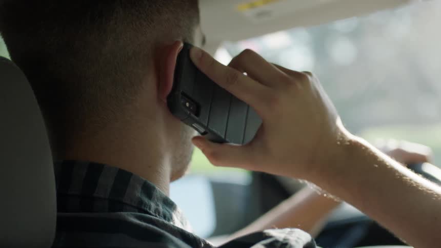 Man On Phone While Driving