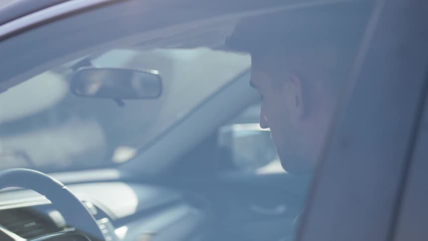 Man On Phone While Driving