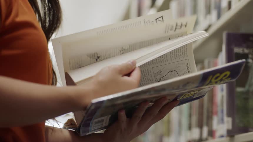 Flipping through pages in a book