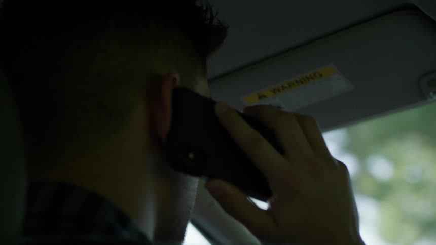 Man On Phone While Driving