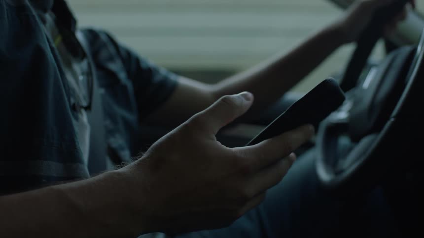 Man On Phone While Driving