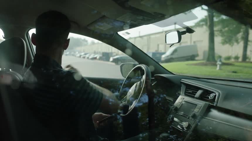 Man On Phone While Driving
