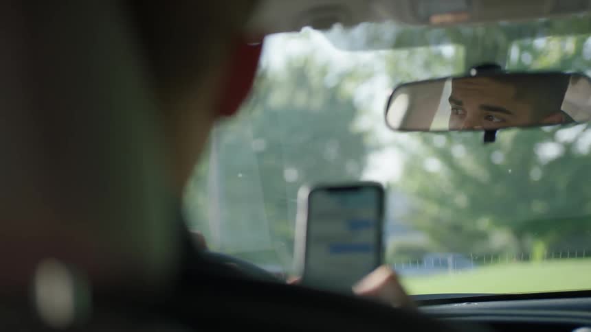 Man On Phone While Driving