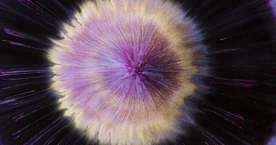 A drop of ink forms a unique pattern like a star burst