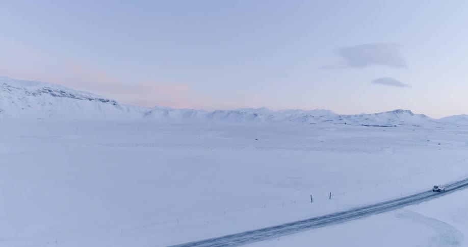 Couple In Snowy Landscape