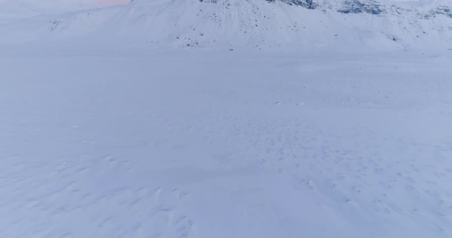 Couple In Snowy Landscape