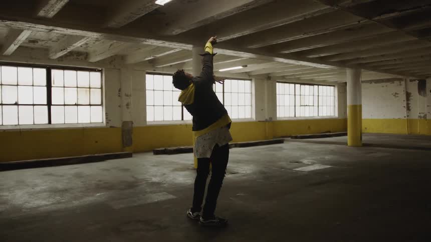 People Dancing In Abandoned Warehouse
