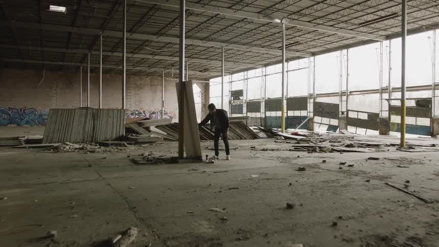 People Dancing In Abandoned Warehouse