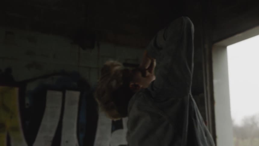 People Dancing In Abandoned Warehouse