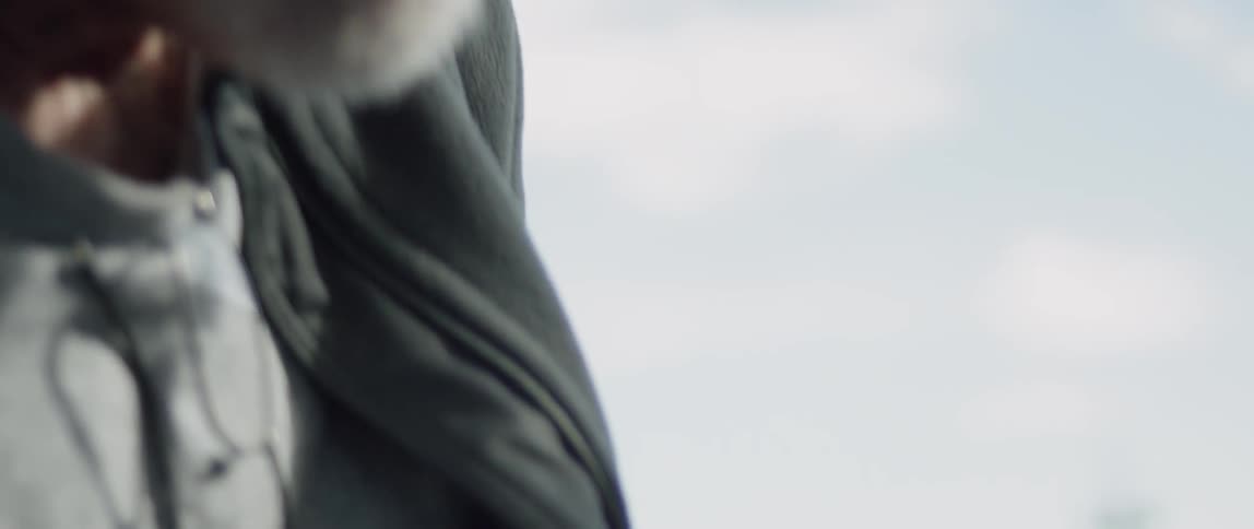 A man looks at a gauge