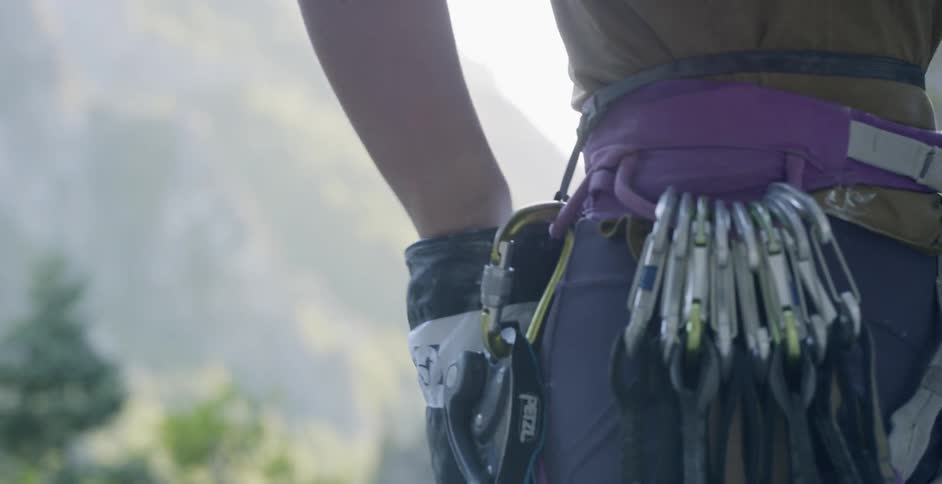 Woman Rock Climbing In Nature