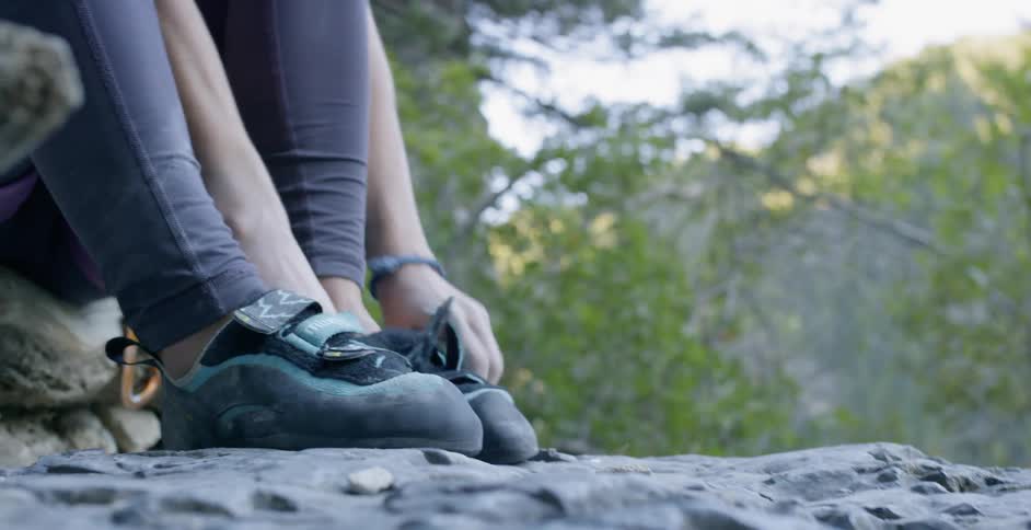 Woman Rock Climbing In Nature