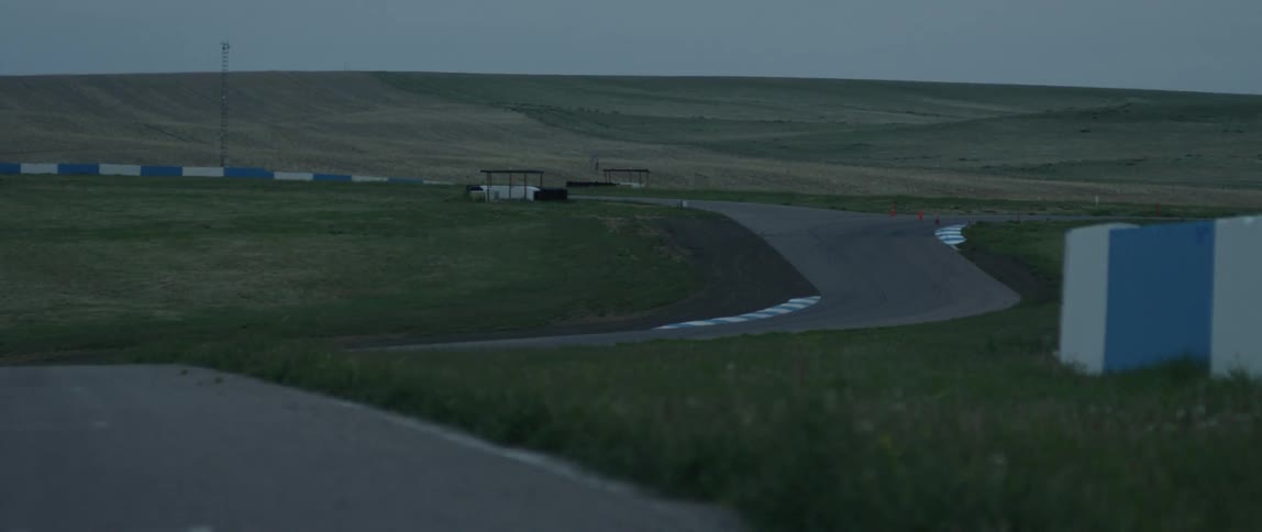 An empty track has a large range behind it