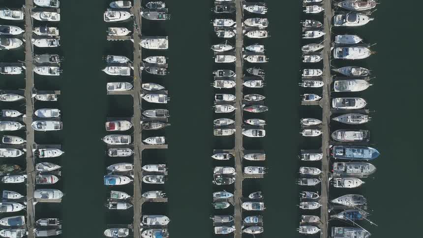 Rows of boats on parallel docks