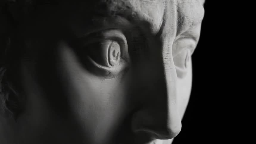A statue is stretched and compressed