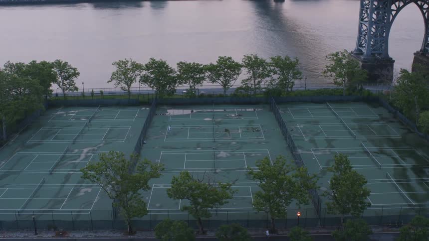 Tennis Player Practicing Serve