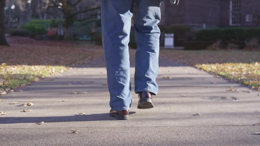 Man walking on the sidewalk