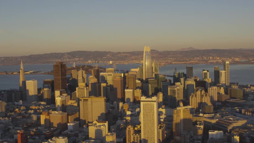 An aerial view of the city next to the ocean