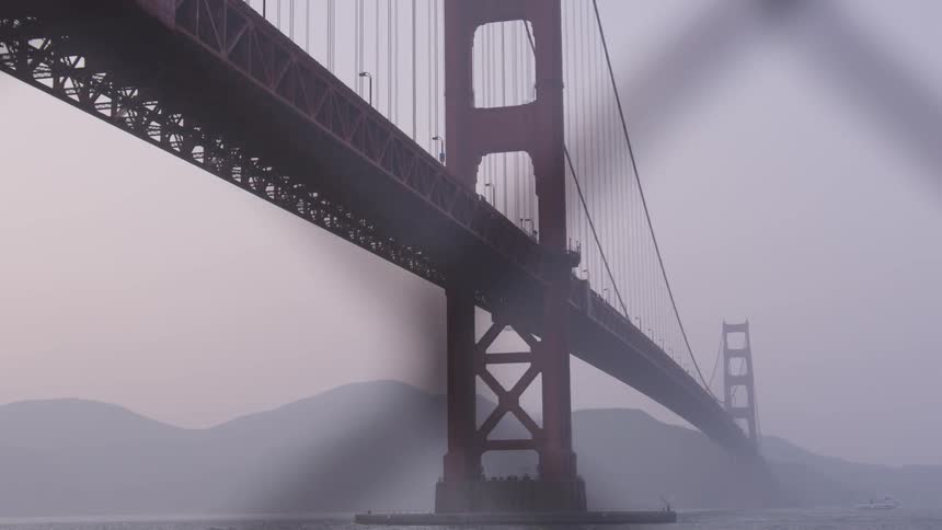 A bridge that is spanning over a large body of water