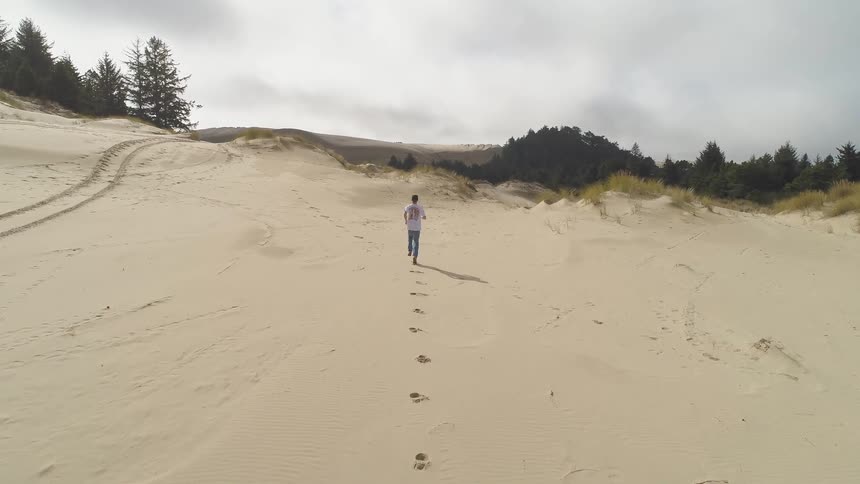Man running in the sand