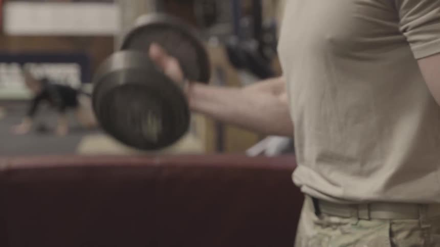A man is working out in a gym