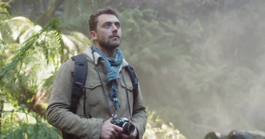 Man Exploring Waterfall