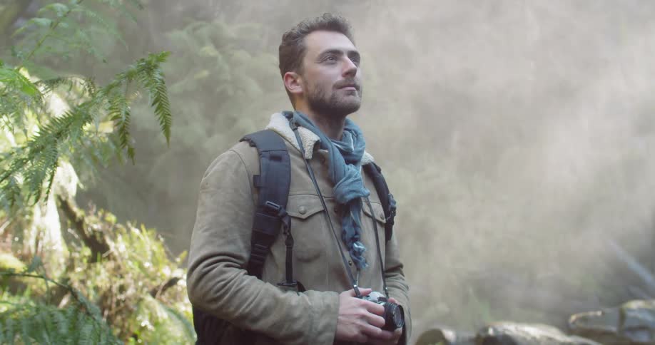 Man Exploring Waterfall