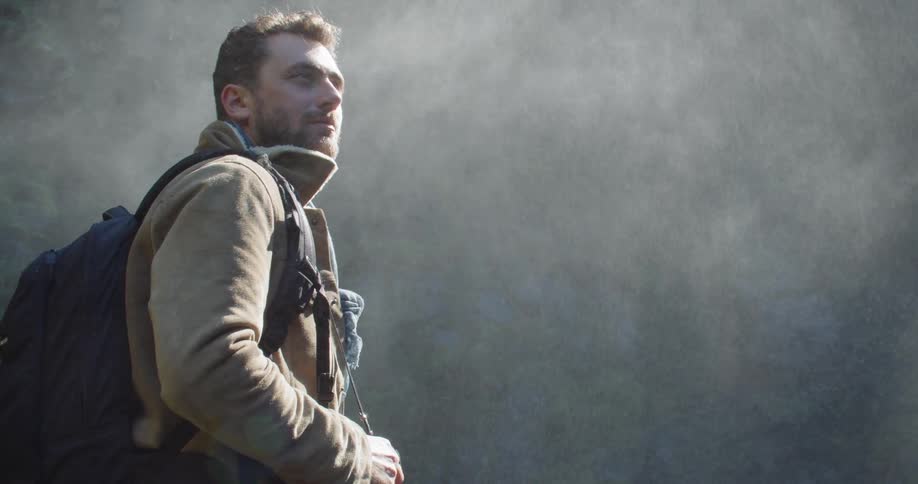 Man Exploring Waterfall