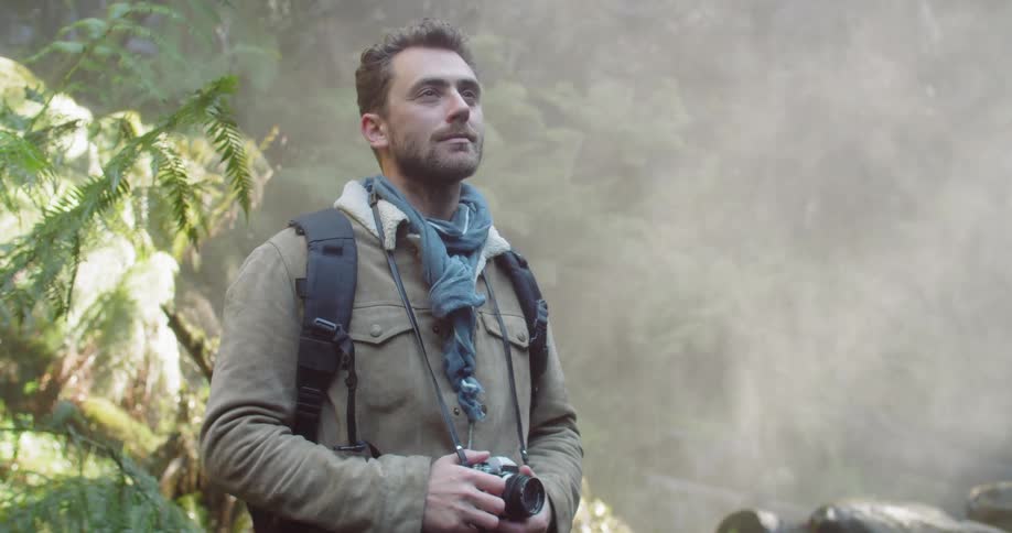 Man Exploring Waterfall