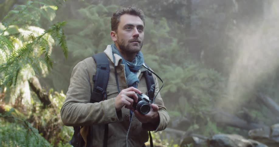 Man Exploring Waterfall