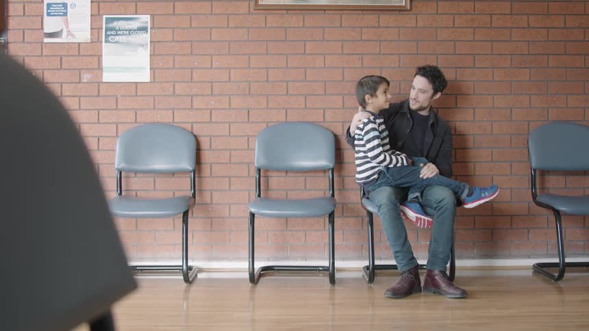 Father And Son At Doctors Appointment