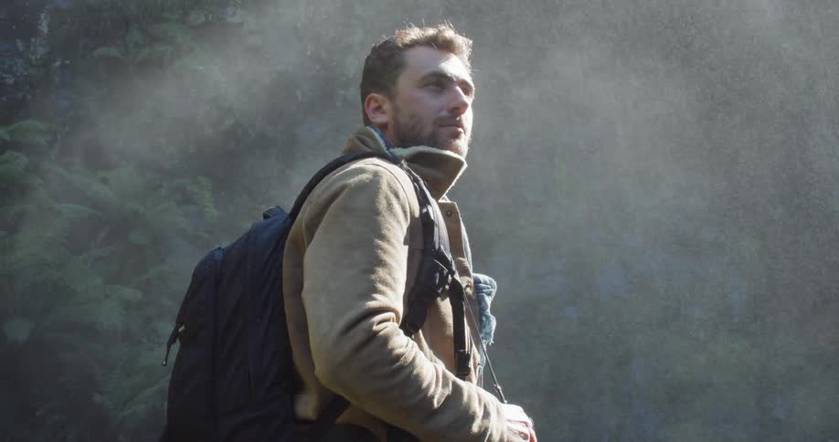 Man Exploring Waterfall