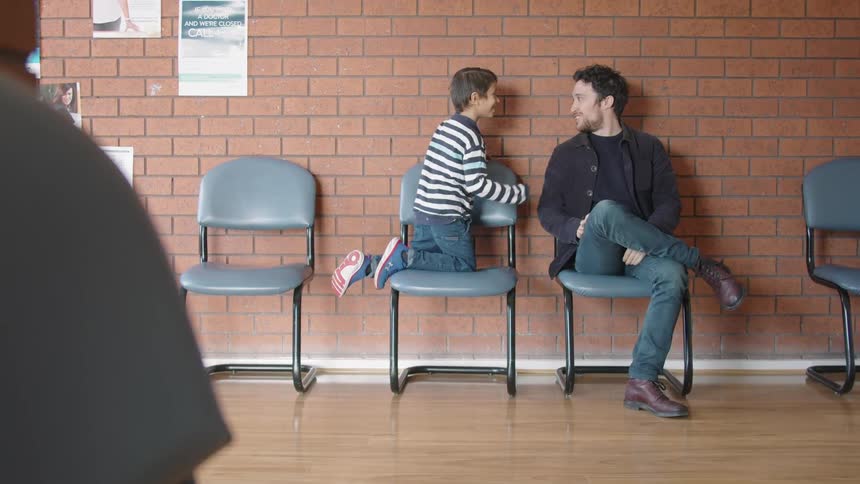 Father And Son At Doctors Appointment