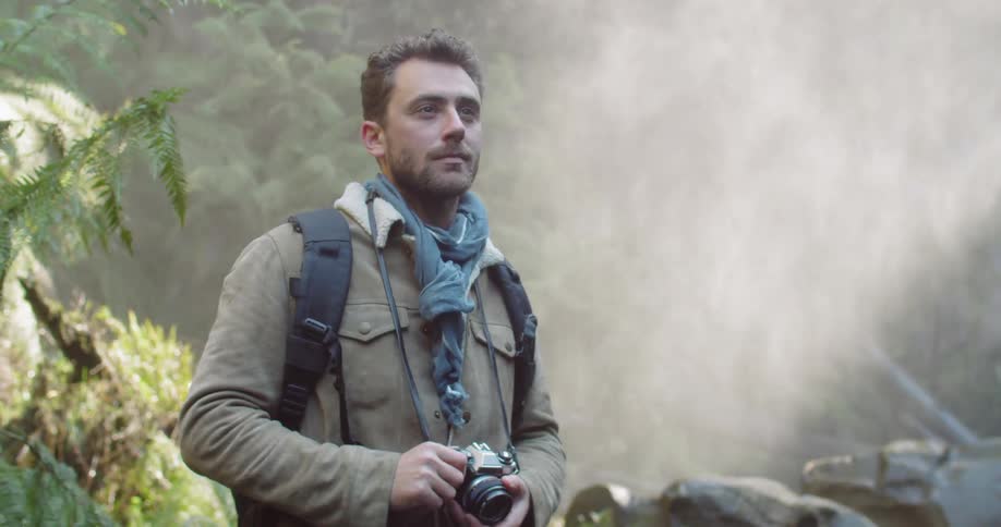 Man Exploring Waterfall