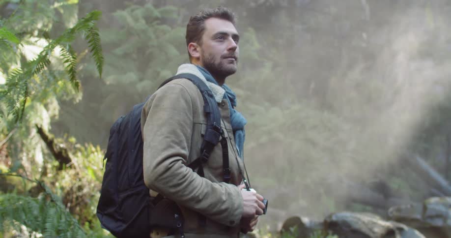 Man Exploring Waterfall