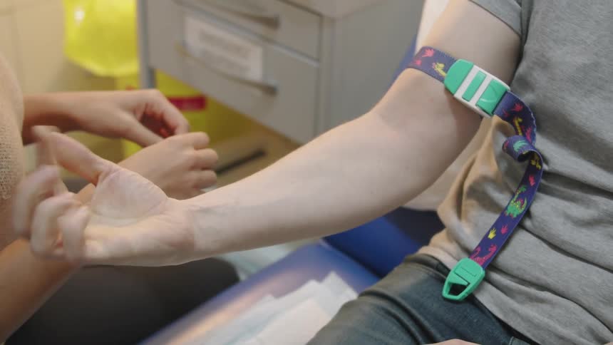 A man is having a blood test