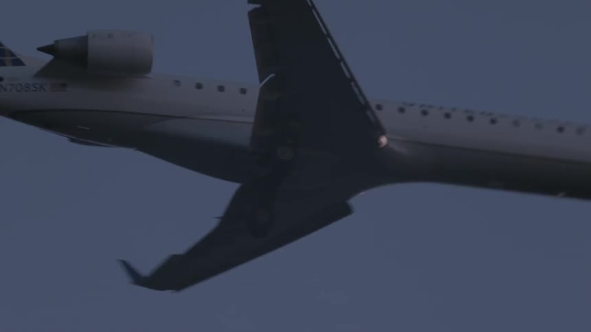 An airplane flying low overhead