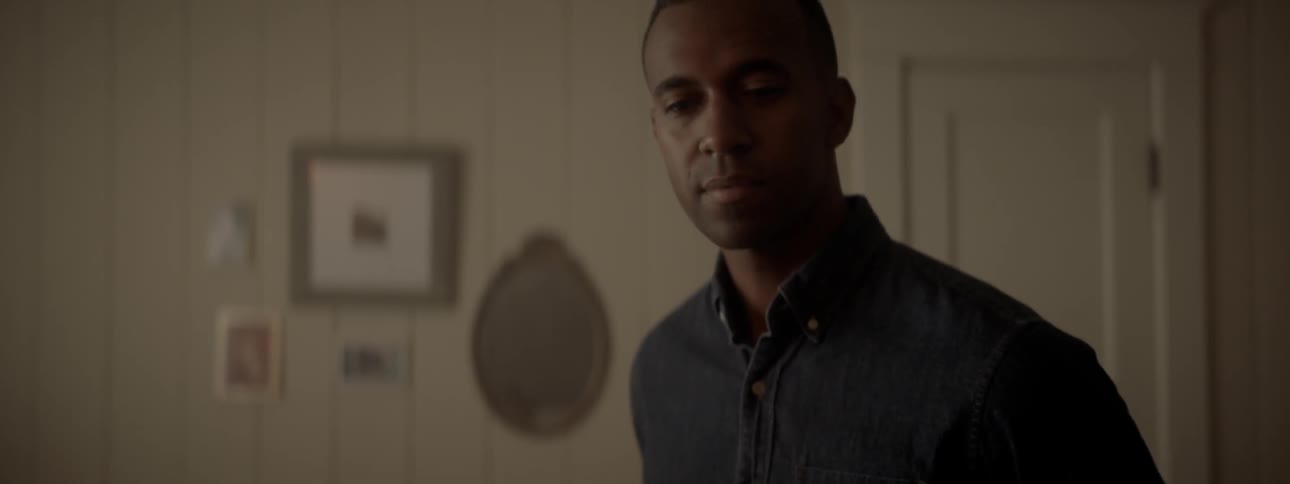 Man looks around room
