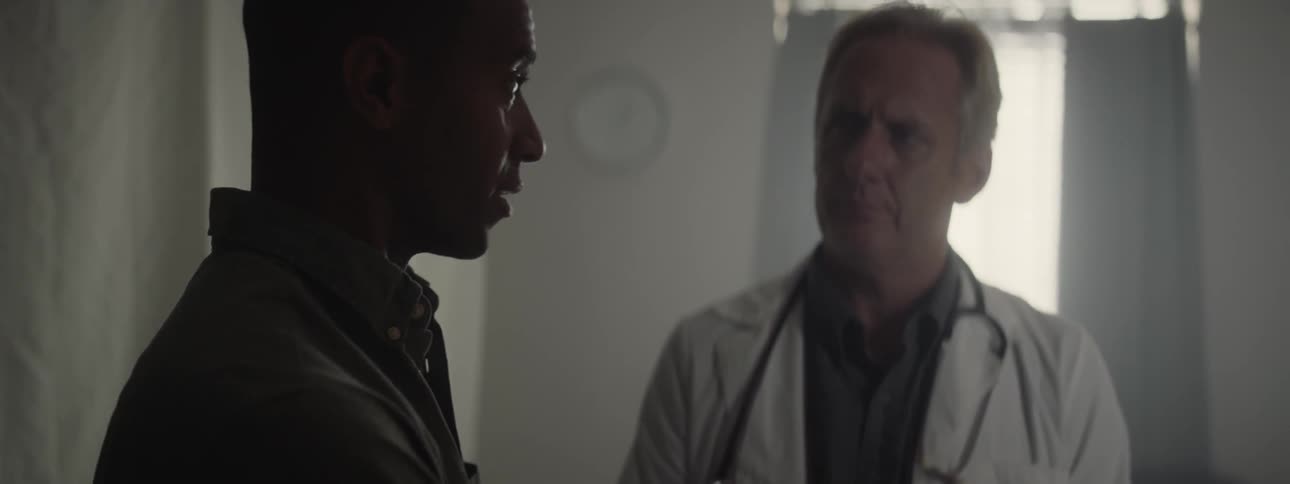 A man speaking with a doctor